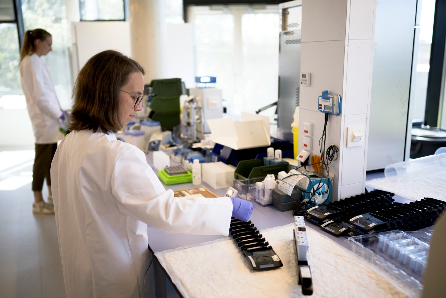 Scientist working at a laboratory bench to investigate ADC platforms.