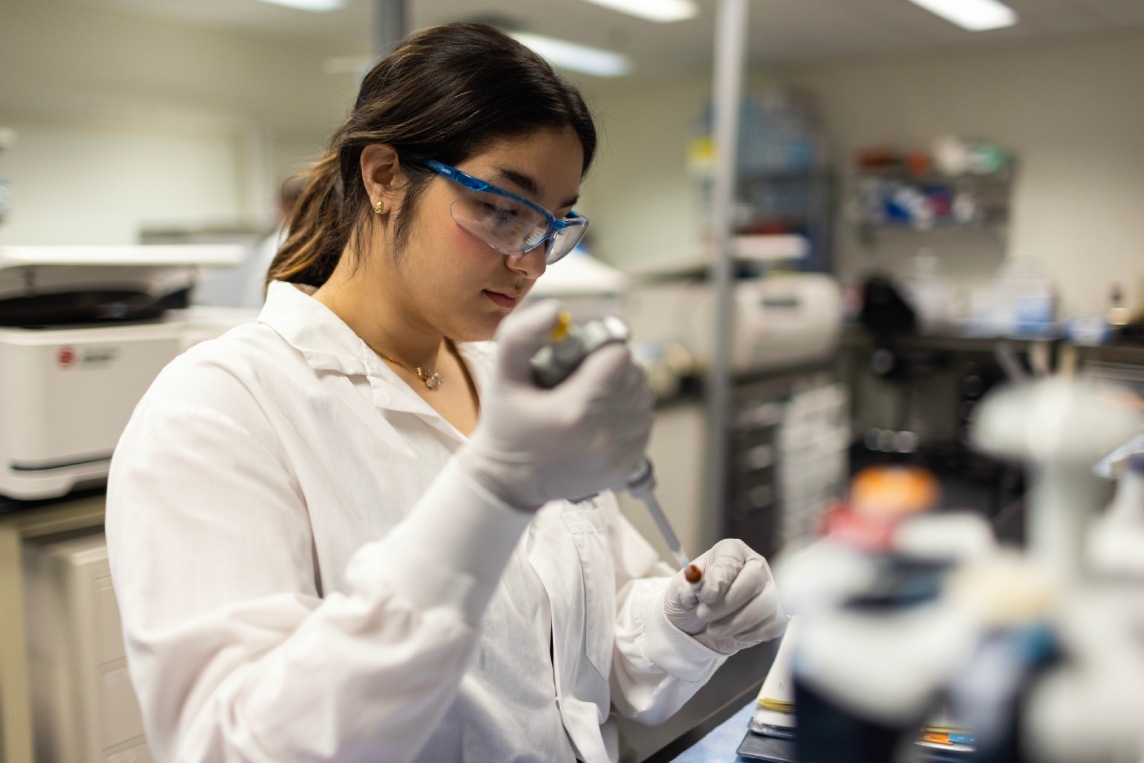 Scientist running analytical assays