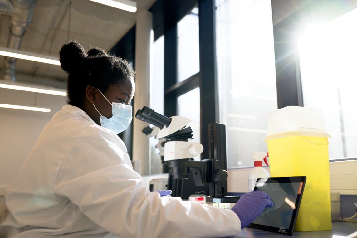 Scientist customizing ELISpot assay in laboratory
