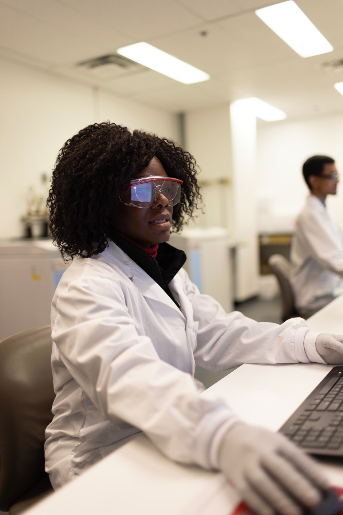 Scientist quantifying protein biomarkers using mass spectrometry