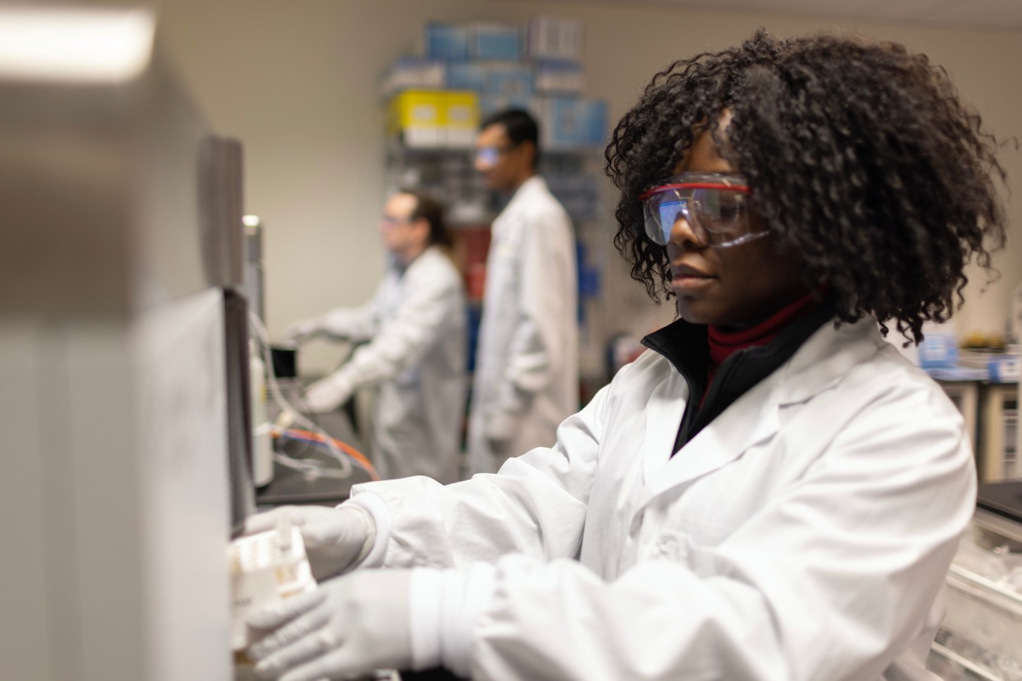 Scientists performing basophil activation assay in the laboratory