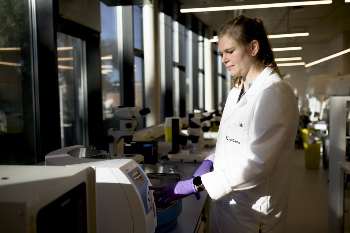 Scientist selecting validated solid tissue and liquid biopsy panels for next-generation sequencing workflow