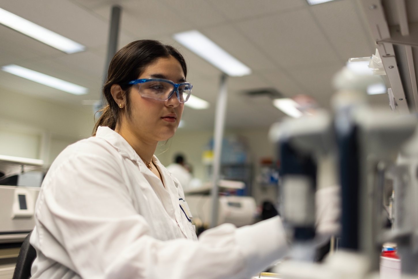Scientist performing PK assay using hybrid LBA/LC-MS platform