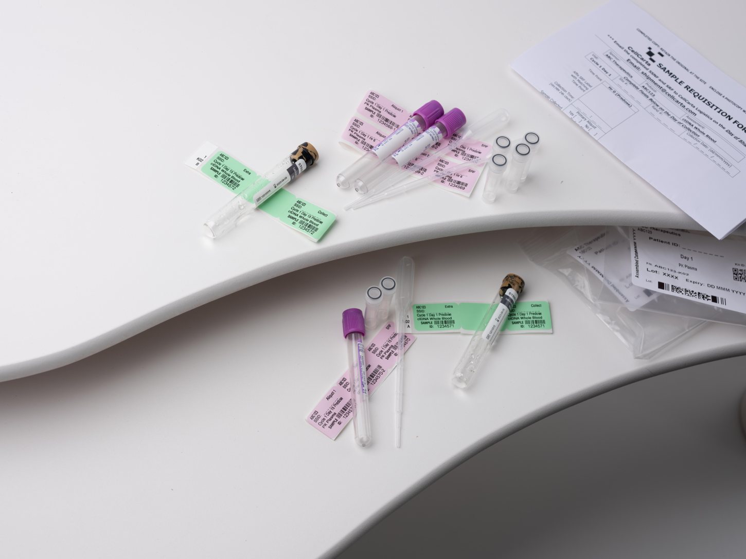 Assorted blood-collection tubes prepared for sample processing.