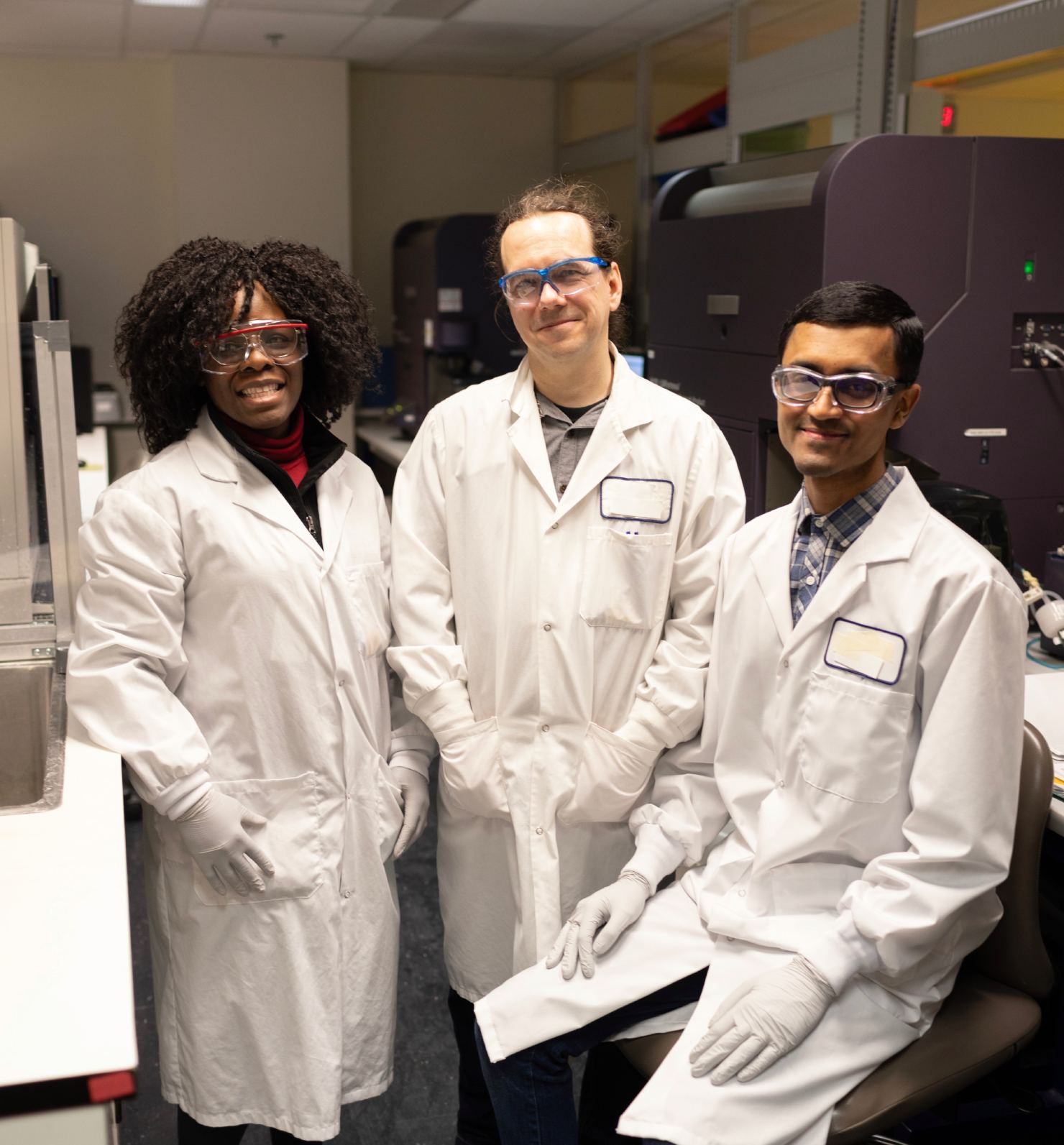 CellCarta mass spectrometry scientists discussing bioanalytical workflows with client team