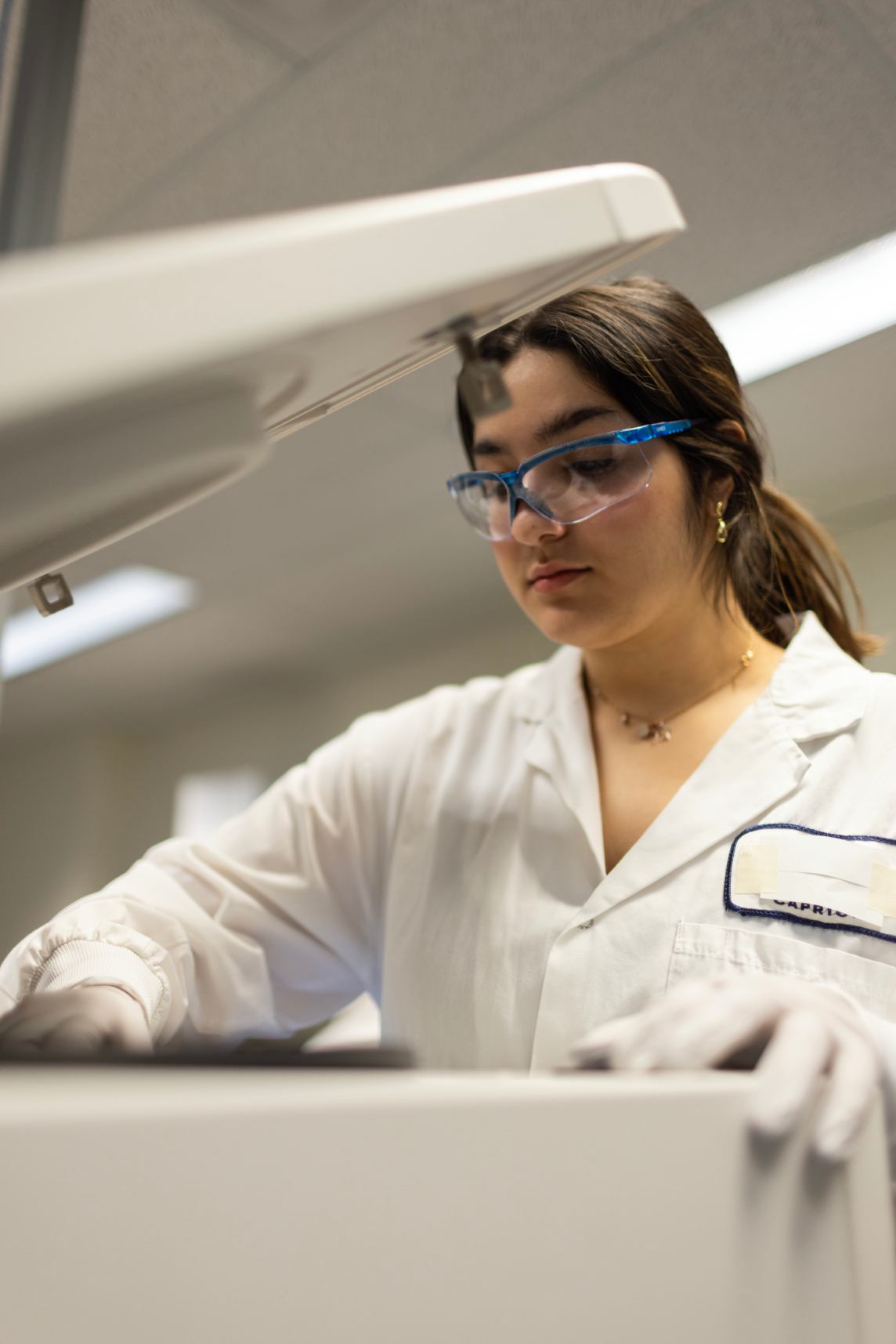 Scientist analysing ELISpot plate at single-cell level