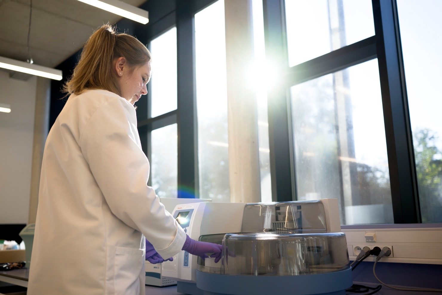 Scientist developing specialized assays for targeted protein degrader potency, dosing, and resistance assessment