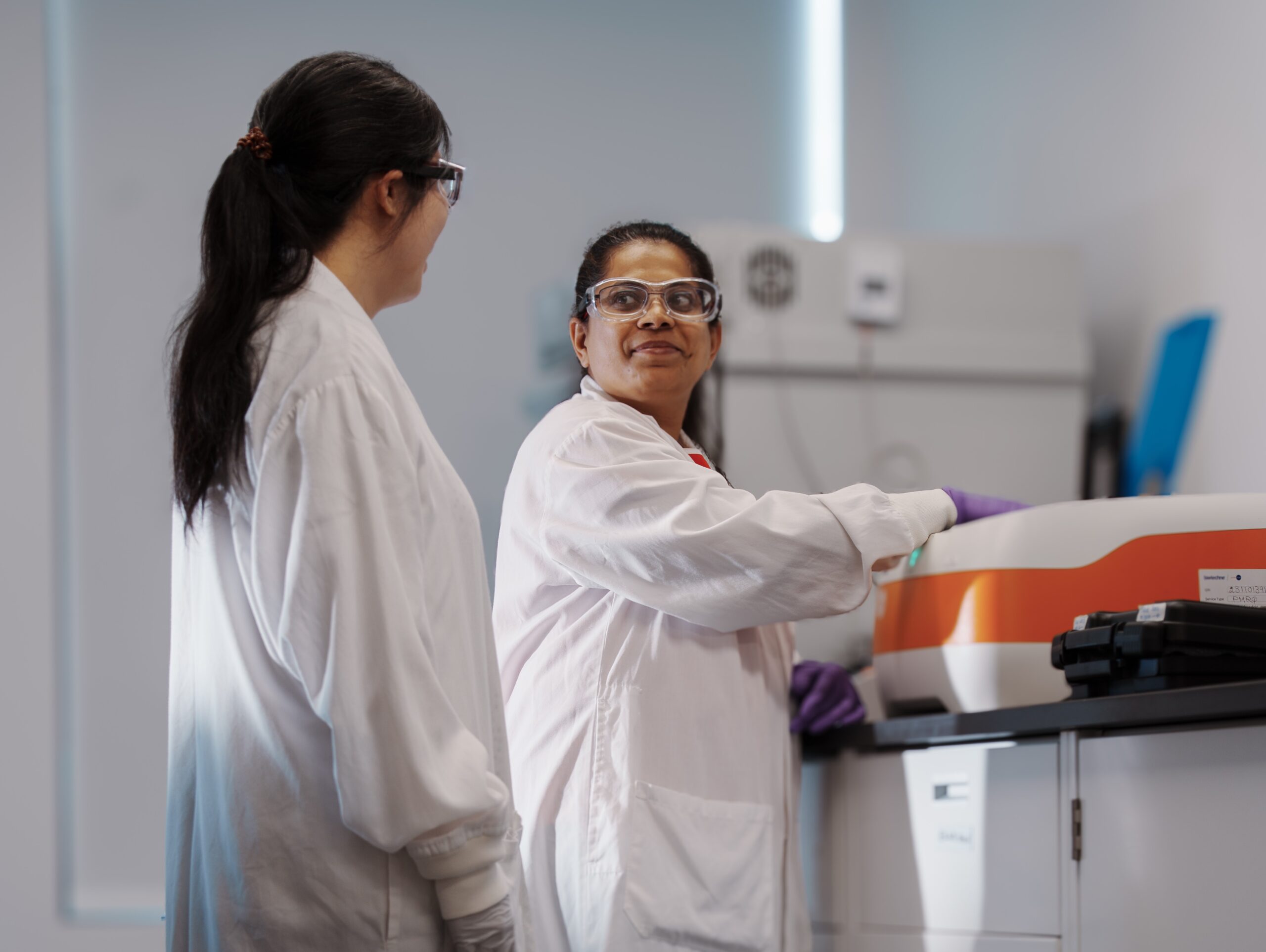 Laboratory corridor showing rapid turnaround workflow for Ella™ assays