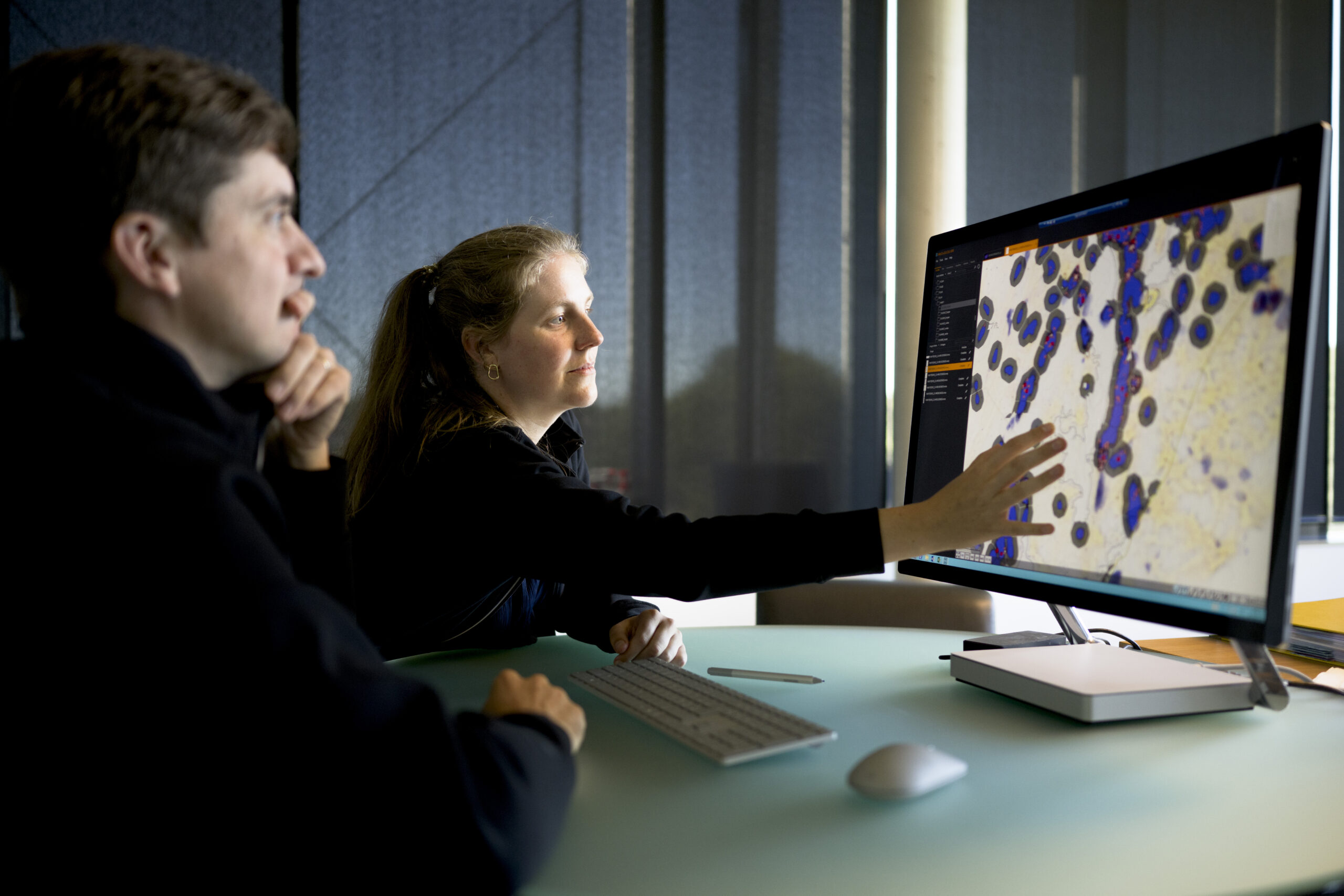 Scientist working with spatial biology tissue samples in the laboratory