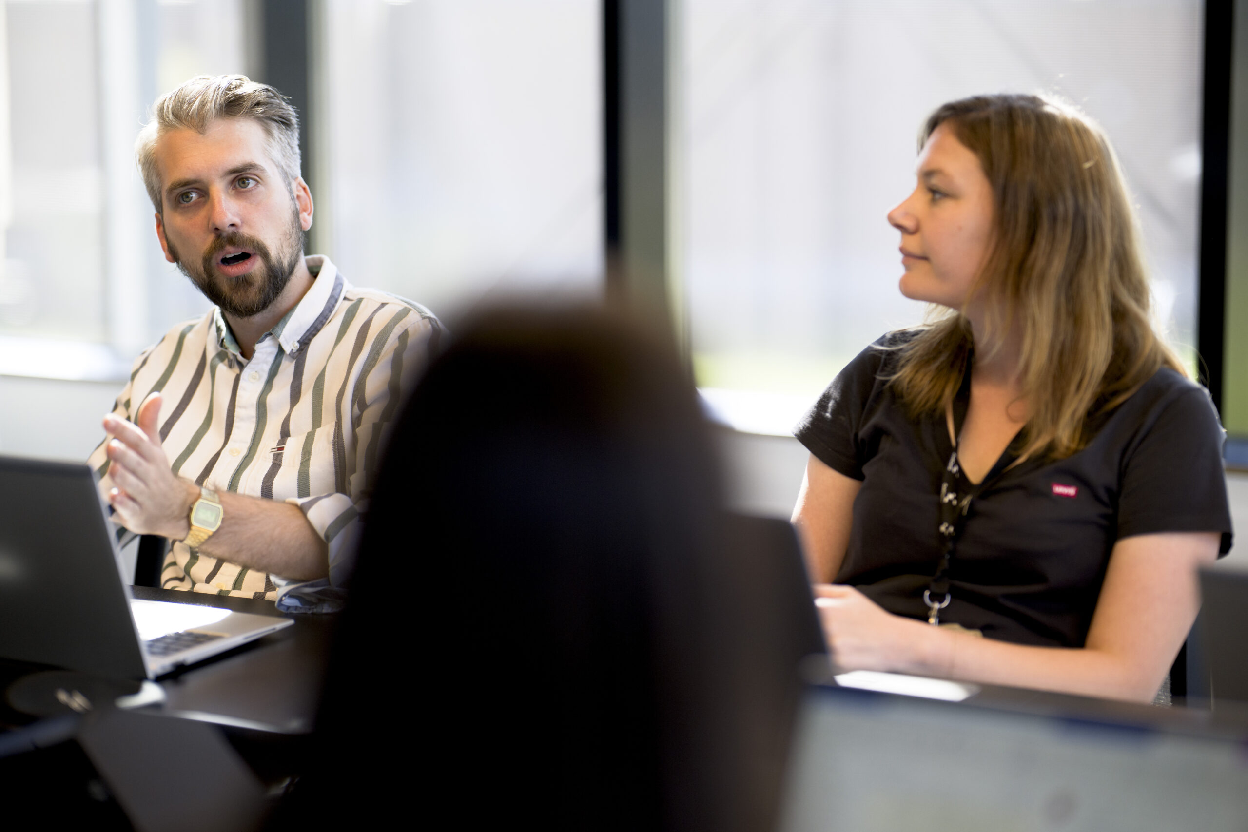 CellCarta team members collaborating in a meeting to plan a clinical trial program.